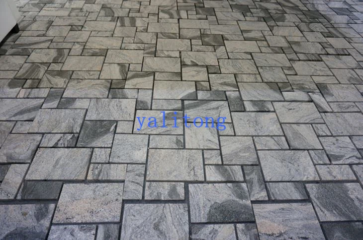 Paviment de rajoles de motius francesos de color gris Juparana