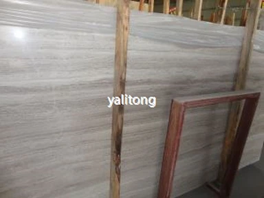 Llosa de marbre blanc de fusta